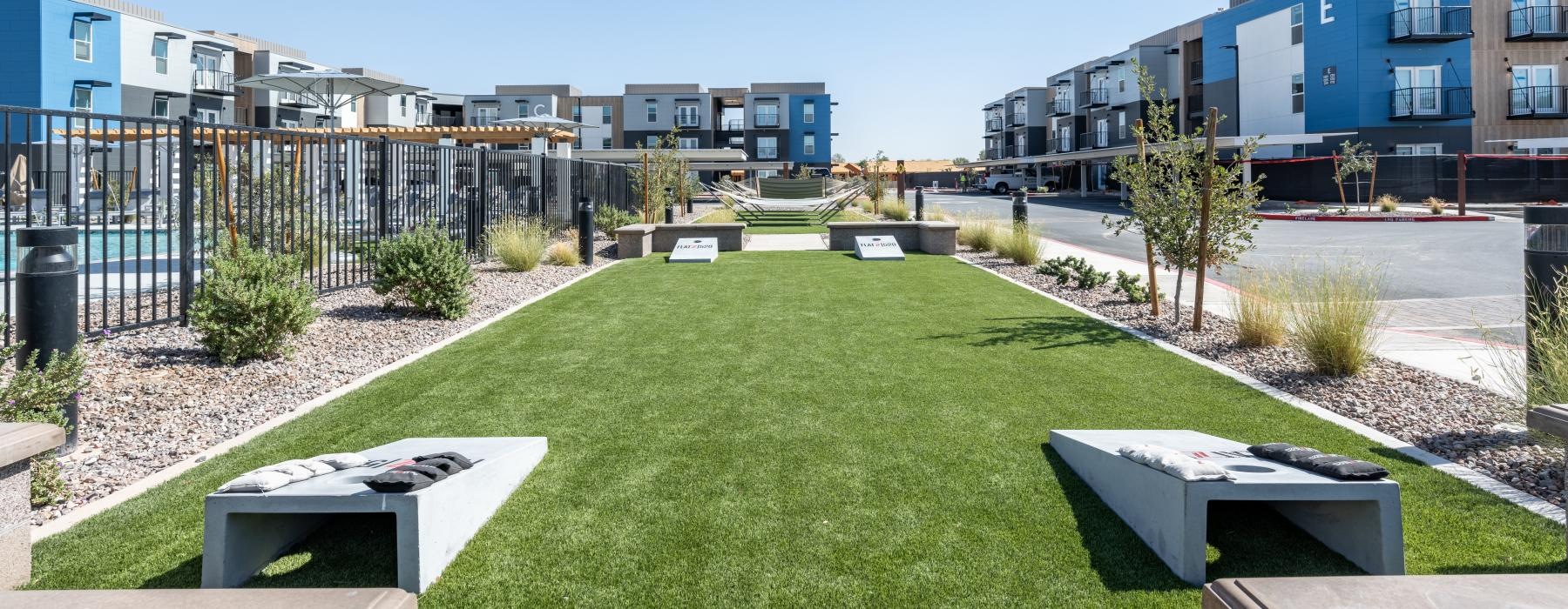 game lawn with corn hole