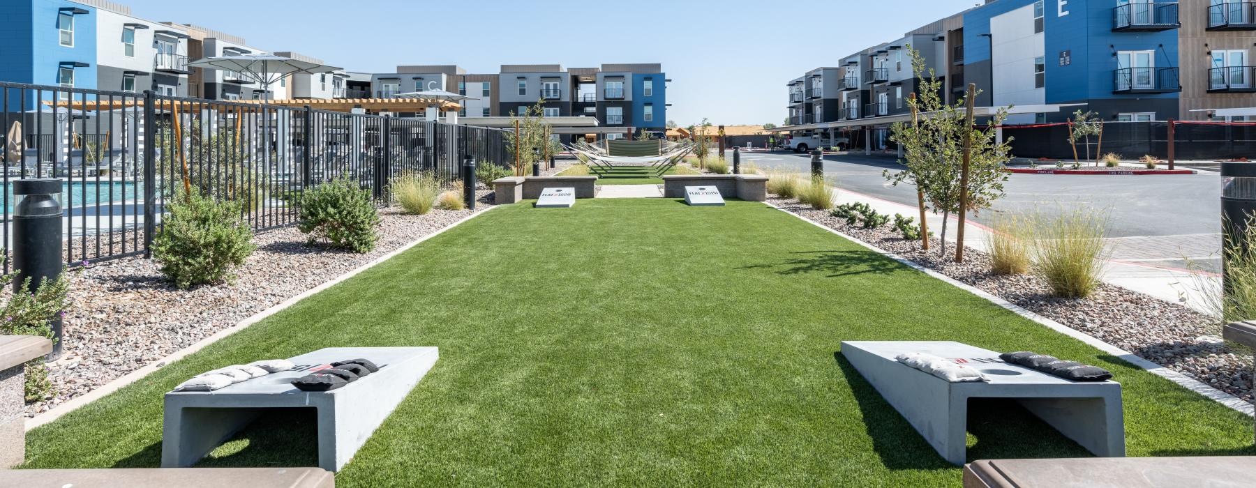 game lawn with corn hole